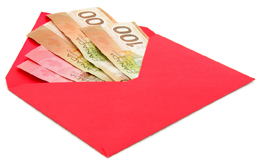 This is a photo of money tucked into a red envelope.