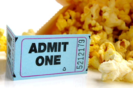 This is a photo of popcorn and an admission ticket.