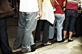 This is a photo of people standing in a line-up.