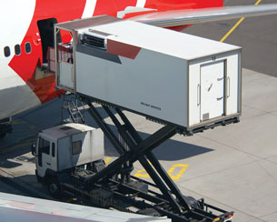 A photo shows cargo being loaded onto a jet airliner.
