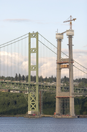 A photograph shows the Tacoma Narrows bridge.